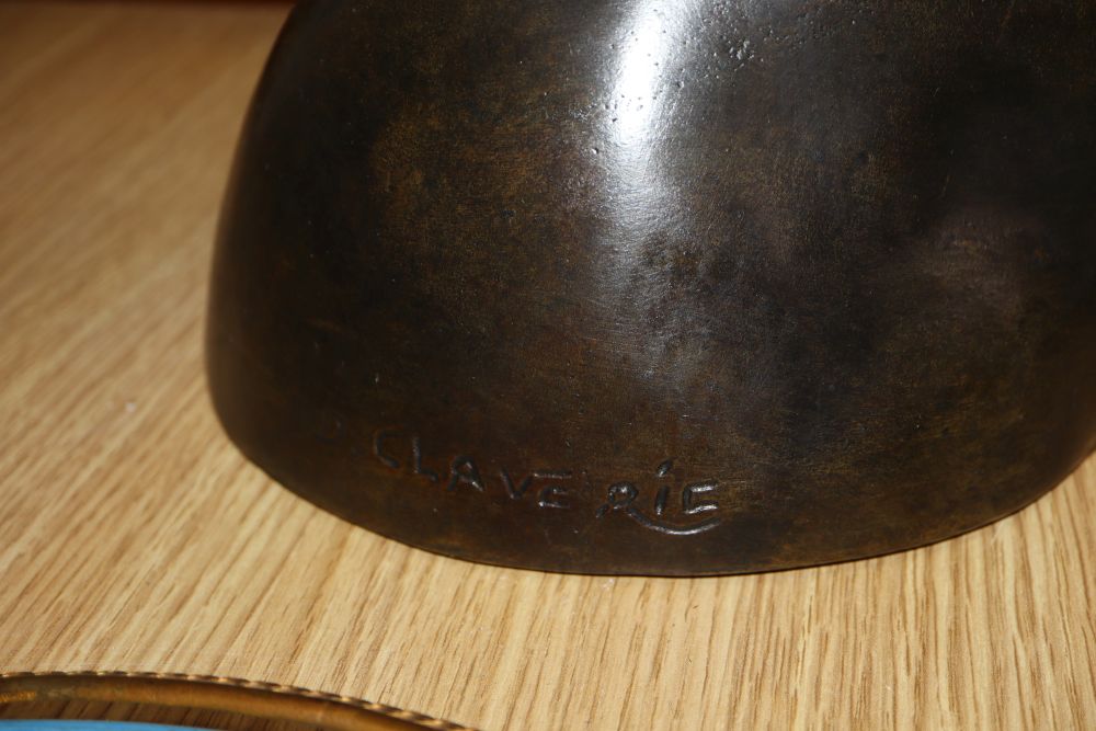 A bronze female torso, signed D. Claveric, height 47cm